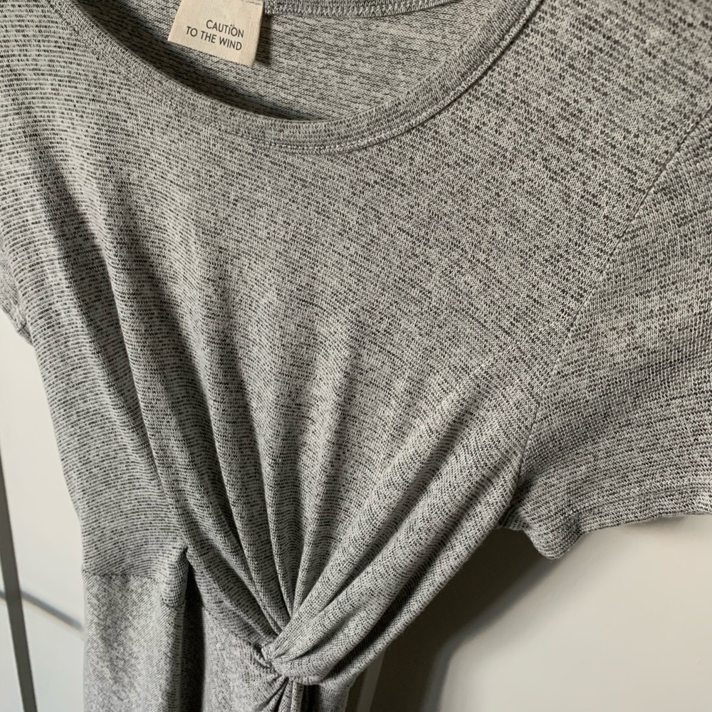 Grey knit dress w/ waist gather detailing.